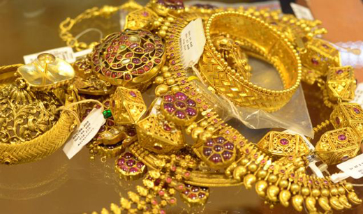Gold prices jump over 4 pc to hit record high